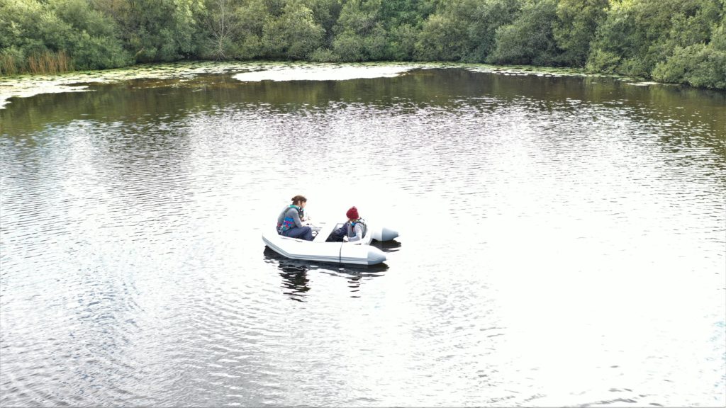 Estelle Kilias and Elisabet Alacid sampling the waters of Priest Pot