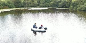 Estelle Kilias and Elisabet Alacid sampling the waters of Priest Pot